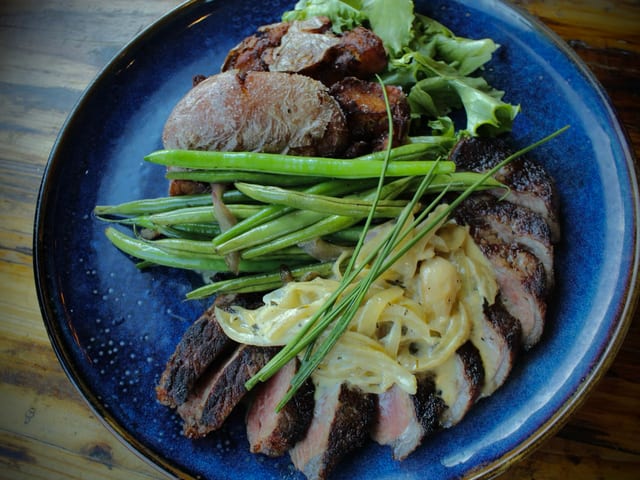 Pepper-Grilled Twin Beef Tenderloin Medallions.